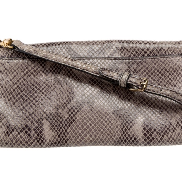 Tory Burch Crossbody Bag
Neutrals SuedeAnimal Print Gold-Tone Hardware. - Picture 4 of 6